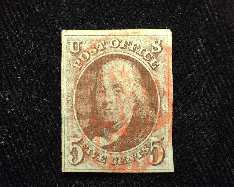 #1 1847 Issue. Large equally balanced 4 margin stamp. Brown color with red grid cancel. Lovely stamp. XF Used  - US Stamp